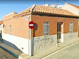 Fe